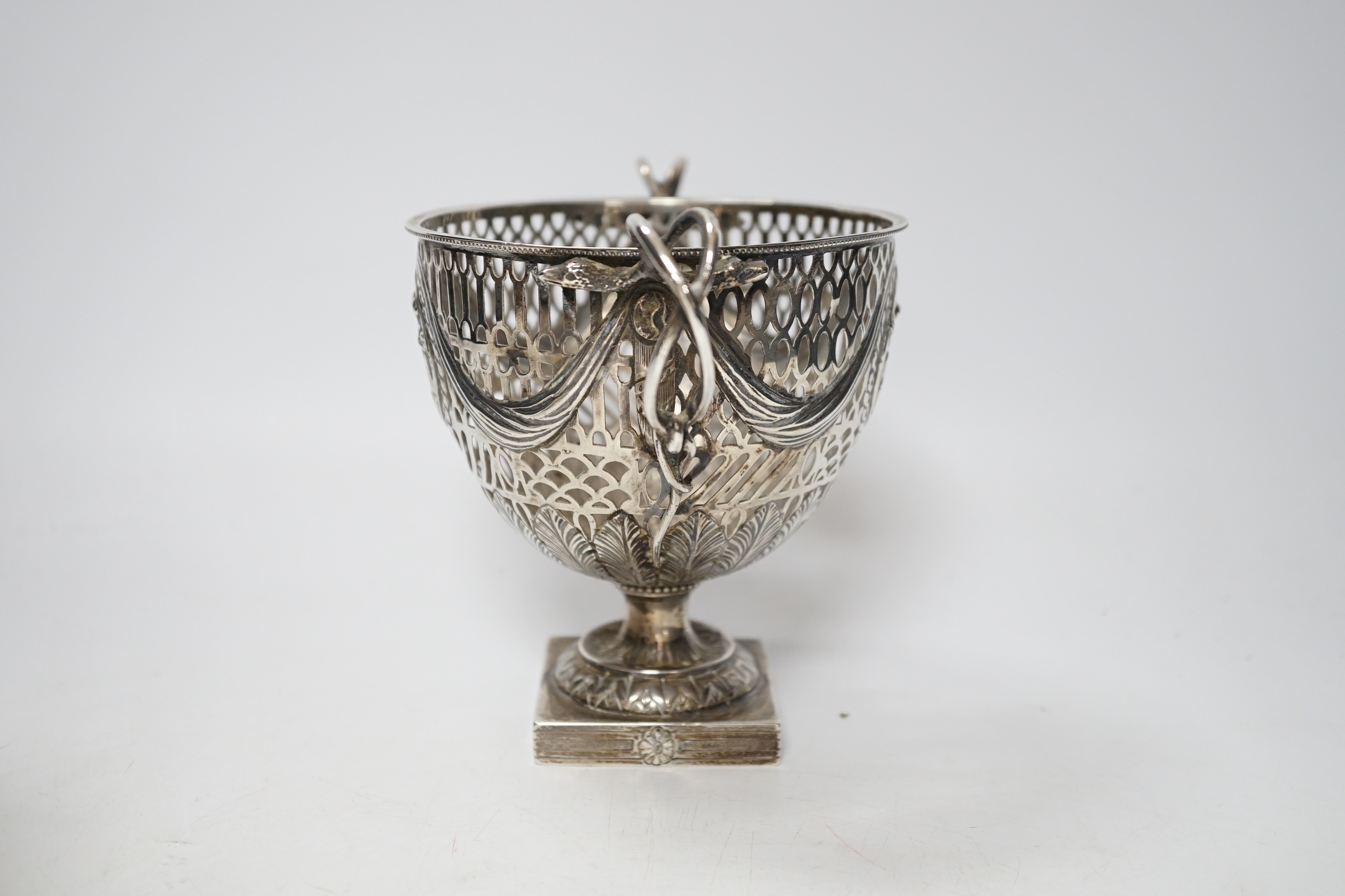 A pair of Thai circular white metal bowls, and a pair of small bowls, all decorated with animals and foliate scrolls, inscribed on bases, diameter 12cm and 8.5cm